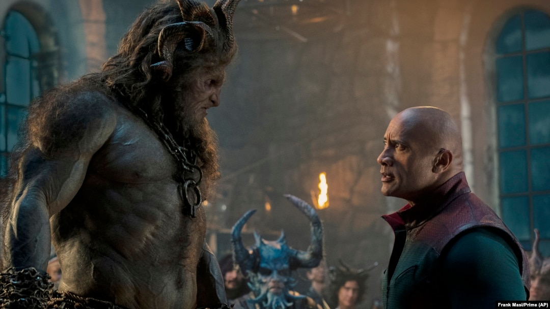 This image released by Prime shows Kristofer Hivju, left, and Dwayne Johnson in a scene from "Red One."