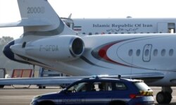 FILE - An Iranian government plane is seen on the tarmac at Biarritz airport in Anglet during the G-7 summit in Biarritz, France, Aug. 25, 2019.