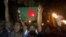 Former Indian enclave residents carry torches and a Bangladesh flag as they celebrate at Dasiarchhara, Kurigram in Bangladesh, as Bangladesh and India swapped tiny islands of land, ending one of the world's most intractable border disputes, Aug. 1, 2015.