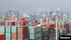 Containers are seen at a port in Lianyungang, Jiangsu Province, China, April 13, 2016. 