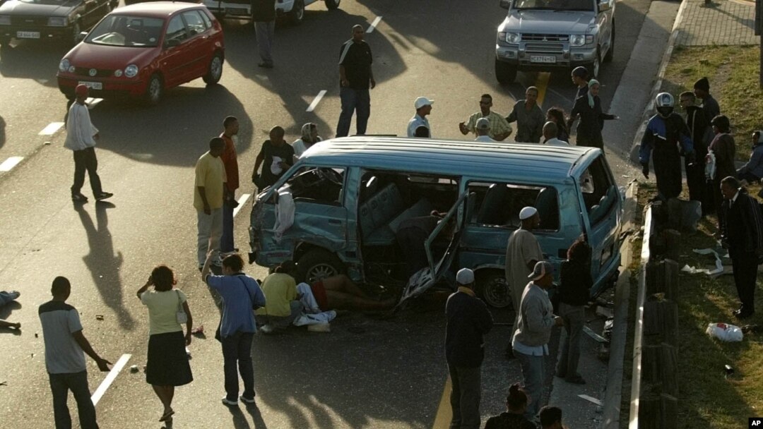 FILE - The site of a car crash is seen in Cape Town, South Africa. During the six-week holiday season, nearly 1,800 South Africans were killed in 1,400 crashes on the country's roads.