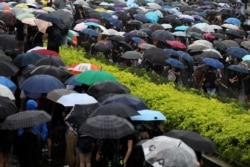 Protesters attend a demonstration demanding Hong Kong's leaders to step down and withdraw the extradition bill, in Hong Kong, China, June 17, 2019.