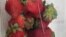 A thin piece of metal is seen among a punnet of strawberries in Gladstone, Australia, Sept. 14, 2018. (Credit: AAP/Queensland Police/Handout)