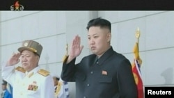 Pemimpin Korea Utara Kim Jong-un dalam salah satu penayangan program televisi pemerintah Korea Utara (Foto: dok). Korean Central Television, telah secara resmi memasuki era Facebook dengan menayangkan secara langsung program-programnya di jarinan media sosial tersebut.