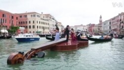 String Quartet Plays Vivaldi on Giant Violin Floating Down Venice Canal