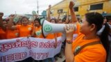 Garment workers shout during a protest calling for higher wages in Phnom Penh September 17, 2014. 