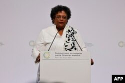 FILE — Prime Minister of Barbados, Mia Mottley delivers a speech during the opening session of the New Global Financial Pact Summit at the Palais Brongniart in Paris on June 22, 2023.