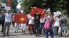 Anti-China protesters march during a protest over the South China Sea dispute, in Hanoi, Vietnam, August 5, 2012.