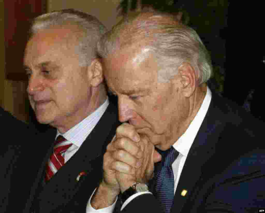 U.S. Vice President Joe Biden, right, is flanked by U. S. ambassador to Turkey, Francis Ricciardone, during a breakfast with Cemil Cicek, the Speaker of Turkish Parliament, unseen, in Ankara, Turkey, Friday, Dec. 2, 2011. Biden called on Turkey to impose
