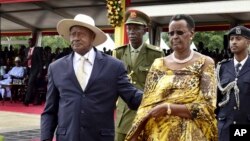 FILE - Uganda's long-time president, Yoweri Museveni, left, and his wife Janet Museveni, are seen at his most recent inauguration ceremony in the capital Kampala, May 12, 2016. 