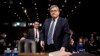 Attorney General nominee William Barr returns from a break in testimony at a Senate Judiciary Committee hearing on Capitol Hill in Washington, Jan. 15, 2019.