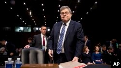 Attorney General nominee William Barr returns from a break in testimony at a Senate Judiciary Committee hearing on Capitol Hill in Washington, Jan. 15, 2019.