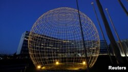 A general view of the United Nations Educational, Scientific and Cultural Organization (UNESCO) headquarters is seen at dusk in Paris, Oct. 12, 2017. 