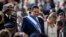 FILE – On his last day as president of El Salvador, Tony Saca and his wife, Ana Ligia de Saca, arrive at the inauguration ceremony of the new president of El Salvador Mauricio Funes in San Salvador, June 1, 2009.
