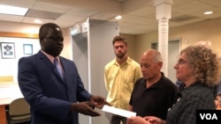 John Allen and Joyce Krajian, parents of the late Christopher Allen, meet with South Sudan’s Ambassador Phillip Jada Natana in Washington, Aug. 26, 2019. (A.Bior/VOA)