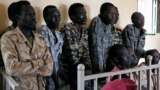 South Sudanese soldiers suspected of raping five foreign aid workers and killing their local colleague are seen before appearing in a military court in South Sudan's capital Juba, May 30, 2017. 