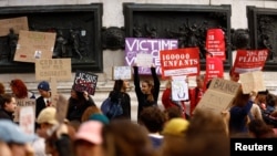 People attend a demonstration in support of rape victims and Gisele Pelicot, who was allegedly drugged and raped by men solicited by her husband Dominique Pelicot, as the trial continues, at the Place de la Republique in Paris, France, Sept. 14, 2024. 