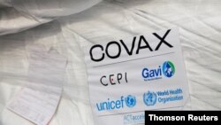 A pack of AstraZeneca/Oxford vaccines is seen as the country receives its first batch of coronavirus disease (COVID-19) vaccines under COVAX scheme, in Accra.