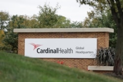 FILE - A sign is displayed at the Cardinal Health, Inc. corporate office in Dublin, Ohio, Oct. 16, 2019.
