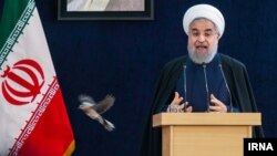 Presiden Iran Hassan Rouhani mengumumkan gugatan terhadap pemerintah AS ke Mahkamah Internasional (foto: dok).