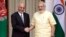  FILE - Indian Prime Minister Narendra Modi (right) shakes hands with Afghan President Ashraf Ghani before a meeting in New Delhi, India, Sept. 14, 2016. 