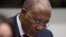Former Liberian President Charles Taylor looks down as he waits for the start of a hearing to deliver verdict in the court room of the Special Court for Sierra Leone in Leidschendam, near The Hague, Netherlands, April 26, 2012.