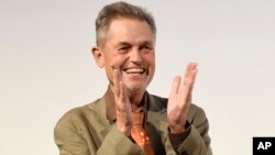 FILE - In this Sept. 13, 2016, photo, Jonathan Demme, director of the concert film "Justin Timberlake + The Tennessee Kids," appears at the premiere at the Toronto International Film Festival. Demme died April 26, 2017, of complications from esophageal cancer in New York. He was 73. 