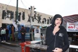 Ali Almikdam attends a protest in Baghdad, Jan. 22, 2020. (Heather Murdock/VOA)