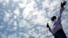 FILE - Merera Gudina, a leader of Ethiopia's biggest opposition coalition, Medrek, addresses supporters at a rally in the Oromia region, May 15, 2010. A media outlet close to the ruling party reports, Jan 15, 2018, that opposition leaders Merera Gudina and Rufael Disasa were among those set to be released.