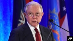 FILE - U.S. Attorney General Jeff Sessions speaks at the National Association of Attorneys General Winter Meeting in Washington, Feb. 27, 2018. 