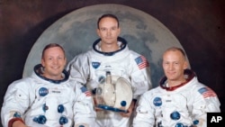 Kru Apollo 11 dari kiri, Neil Armstrong (komandan), Michael Collins (pilot), Edwin E. "Buzz" Aldrin (pilot). Apollo 11 adalah misi berawak pertama yang mendarat di permukaan bulan, 30 Maret 1969. (Foto: NASA via AP)