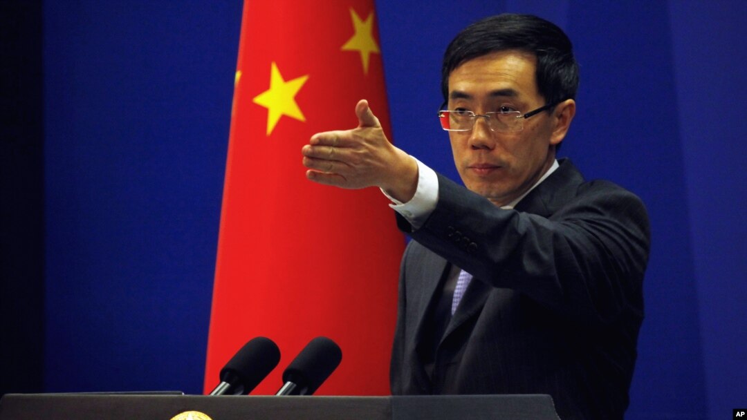 China's Foreign Ministry spokesman Liu Weimin gestures during a news conference in Beijing (file photo).