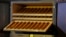 FILE - Cigars lay inside of a humidor made with panels of 24-karat gold-plated tobacco leaves in Havana, Cuba, Feb. 29, 2016. 