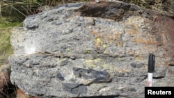 A bed of rock showing chunks of ripped up seafloor dating back to about 3.26 billion years ago. seen in a region called the Barberton Greenstone Belt in northeastern South Africa in this undated photograph. (Nadja Drabon/Handout via REUTERS)