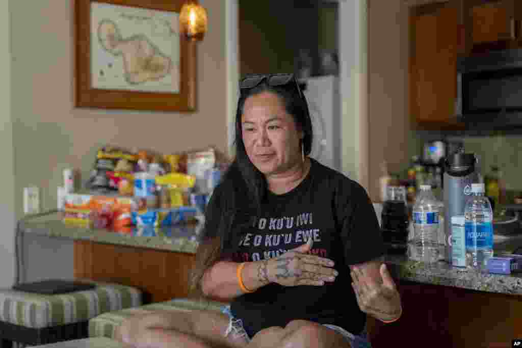 Tiffany Teruya talks about her opinions on housing and education issues affected by August&#39;s wildfire on Oct. 3, 2023, in Lahaina, Hawaii. Teruya&#39;s two-bedroom apartment at Kaiaulu o Kupuohi, a 89-unit affordable rental housing, burned down from August&#39;s wildfire.