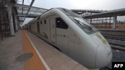 FILE - Nigeria's new standard gauge shuttling between the economic hub of Lagos and Ibadan, the regional capital of southwest Nigeria at the Ebute-Metta Lagos Station, March 16, 2021. The new rail line was built by the China Civil Engineering Construction Corporation. 