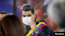 El presidente de Venezuela, Nicolás Maduro, hace un gesto mientras asiste a una ceremonia que marca la apertura del nuevo período judicial, en Caracas, Venezuela, el 27 de enero de 2022.