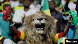 Soccer (Football) fans erupt in joy at Ahmadou Ahidjo Stadium in Yaounde, Cameroon during AFCON's semi final game between Burkina Faso and Senegal, Feb. 2, 2022.