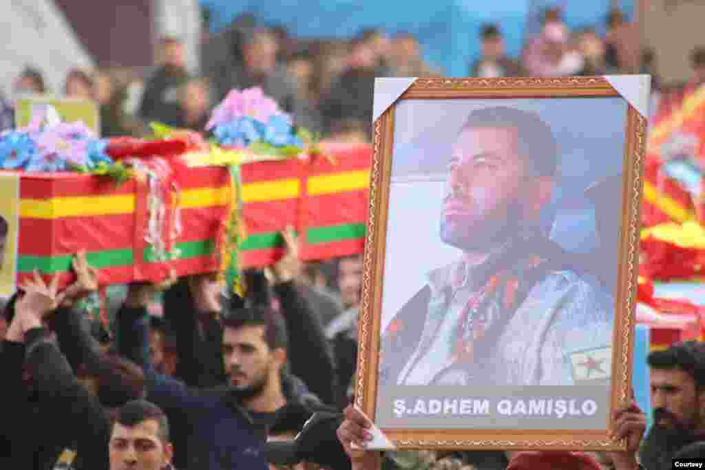 A funeral service for 12 members of the Syrian Democratic Forces (SDF) was held in al-Qamishli on Wednesday. 