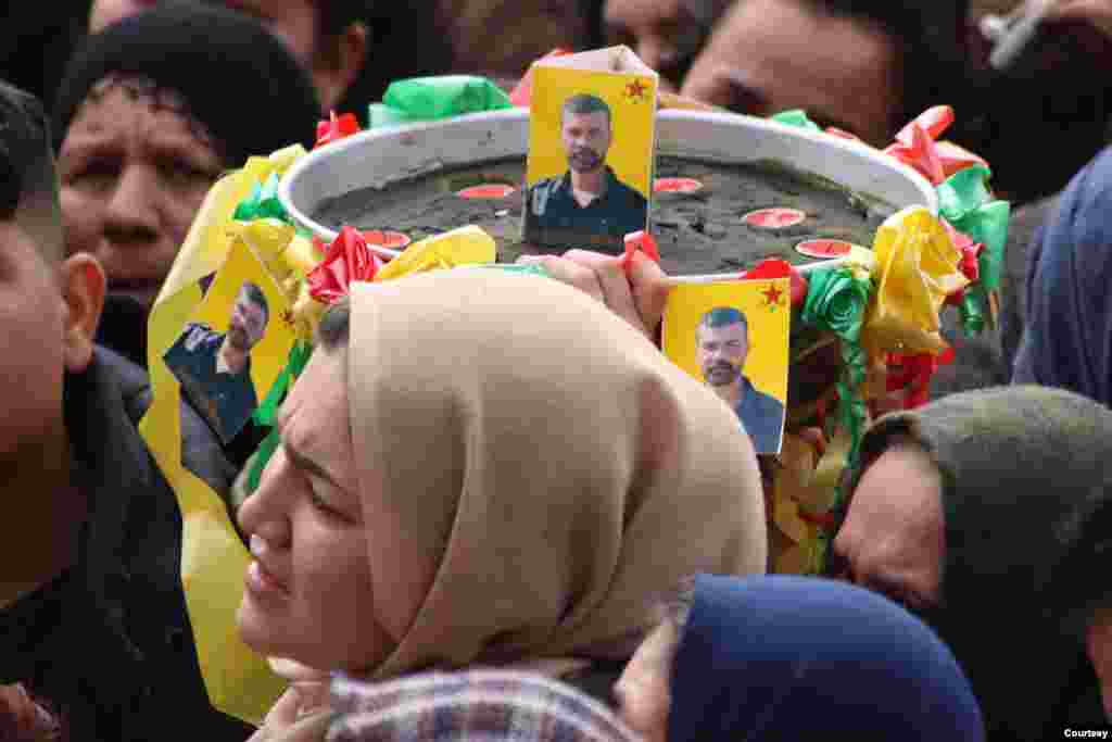 A funeral service for 12 members of the Syrian Democratic Forces (SDF) was held in al-Qamishli on Wednesday.