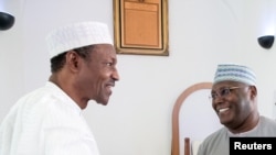 Shugaban Najeriya Muhammadu Buhari (Hagu) da dan takarar jam'iyyar PDP, Atiku Abubakar (Dama)