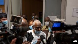 Former World Athletics chief Lamine Diack leaves the courtroom after his trial in Paris, France, Sept. 16, 2020.