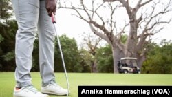 Oumy Dieye, Senegal's only professional female golfer, plays in Saly, Senegal, Jan. 25, 2022. (Annika Hammerschlag/VOA)