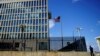 FILE - A security guard stands outside the U.S. Embassy in Havana, Cuba, Dec. 12, 2017.