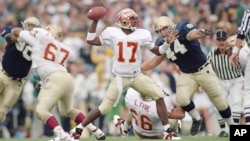 Charlie Ward played quarterback for the Florida State University football team in the 1990s.