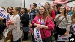 People listen as Senate Minority Leader Mitch McConnell of Ky., a 30-year incumbent, campaigns in Hazard, Ky., Monday, Oct. 27, 2014. (AP Photo/J. Scott Applewhite)