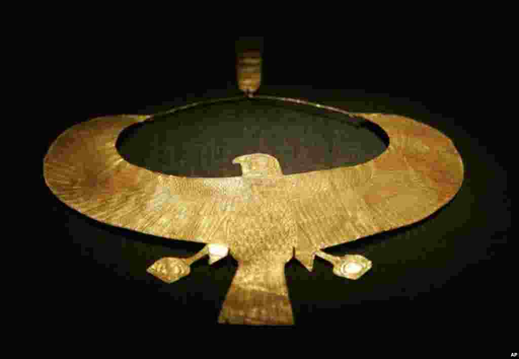 "The Falcon Collar," the collar wrapped around the neck of Tutankhamun's mummy, is shown at the opening of the King Tut exhibit Thursday, Dec. 15, 2005, at the Museum of Art in Fort Lauderdale, Fla. The exhibit opened its doors at the second of four venue