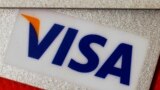 FILE - MasterCard and VISA credit cards are seen in this illustrative photograph taken in Hong Kong, Dec. 8, 2010.
