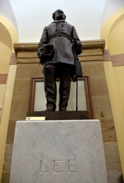 FILE - A statue of Robert E. Lee is on display on Capitol Hill in Washington, June 24, 2015.