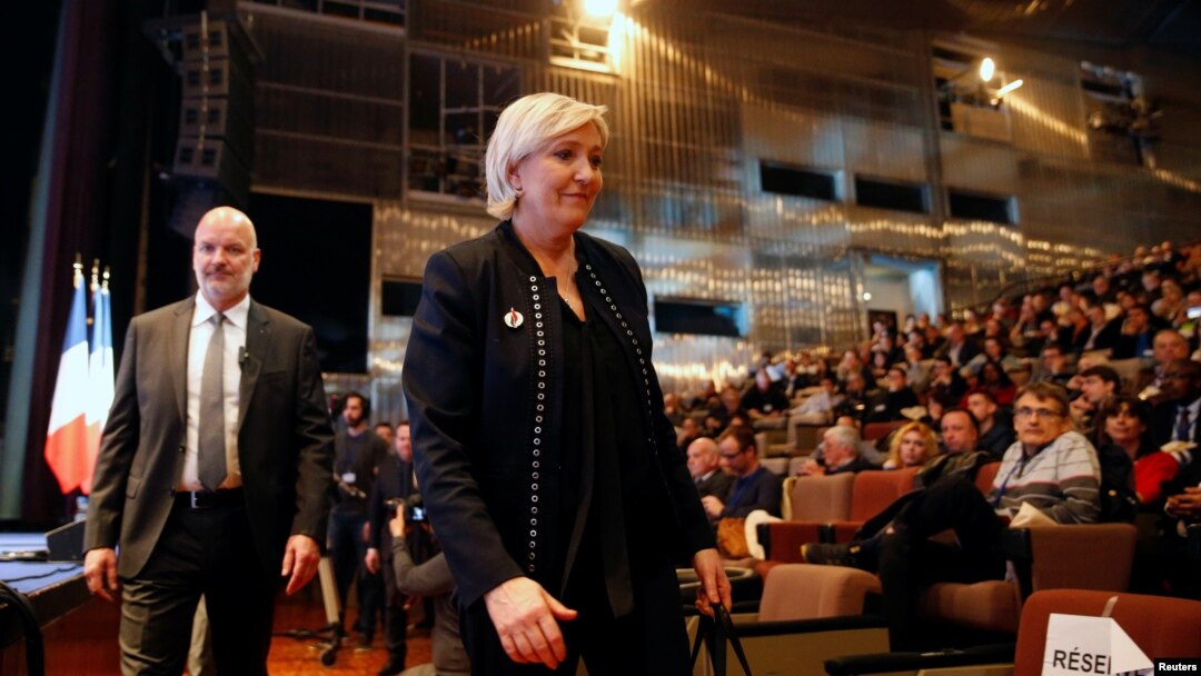 Marine Le Pen, National Front political party leader, attends a news conference, during the party's convention in Lille, France, March 10, 2018.